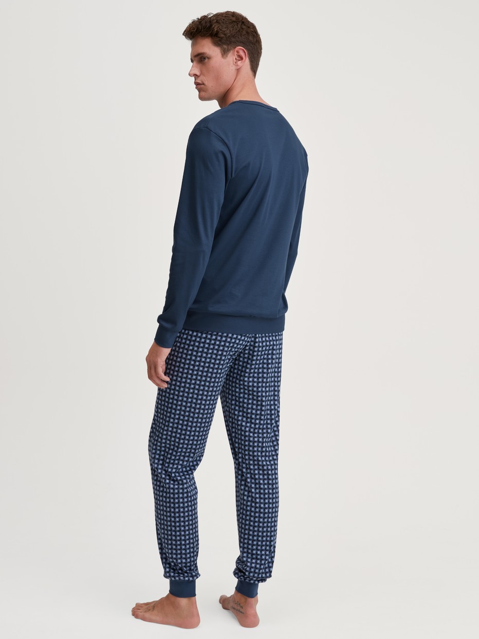 Men model is wearing Pyjama with cuff made of 100% Cotton in Blue, Checked from the Relax Streamline 1 series by CALIDA, Back view