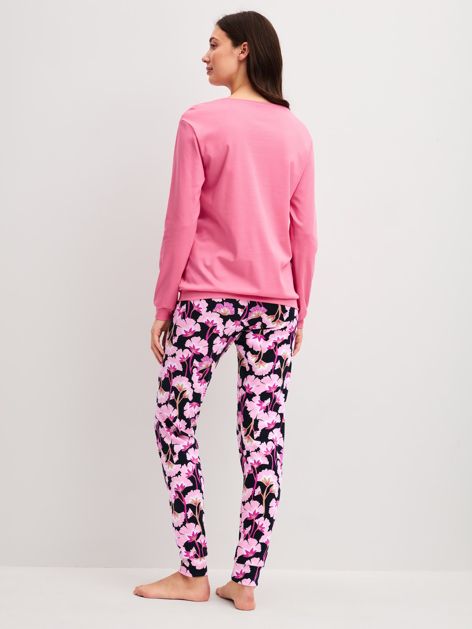 Women model is wearing Pyjama with cuff made of 100% Cotton in Pink, Floral from the Autumn Dreams series by CALIDA, Back view