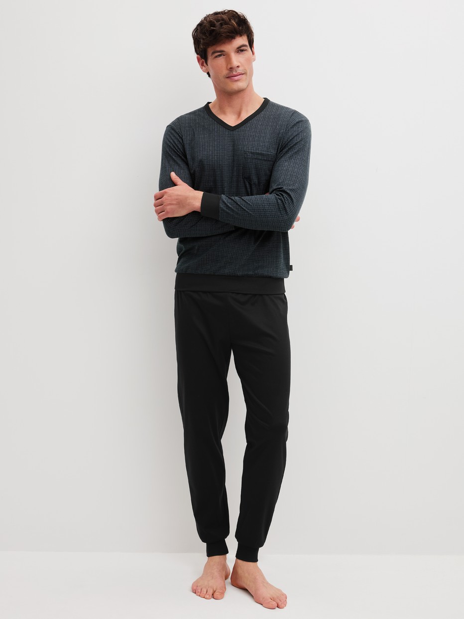 Men model is wearing Pyjama with cuff made of 100% Cotton in Black, Patterned from the Relax Streamline 2 series by CALIDA, Front view
