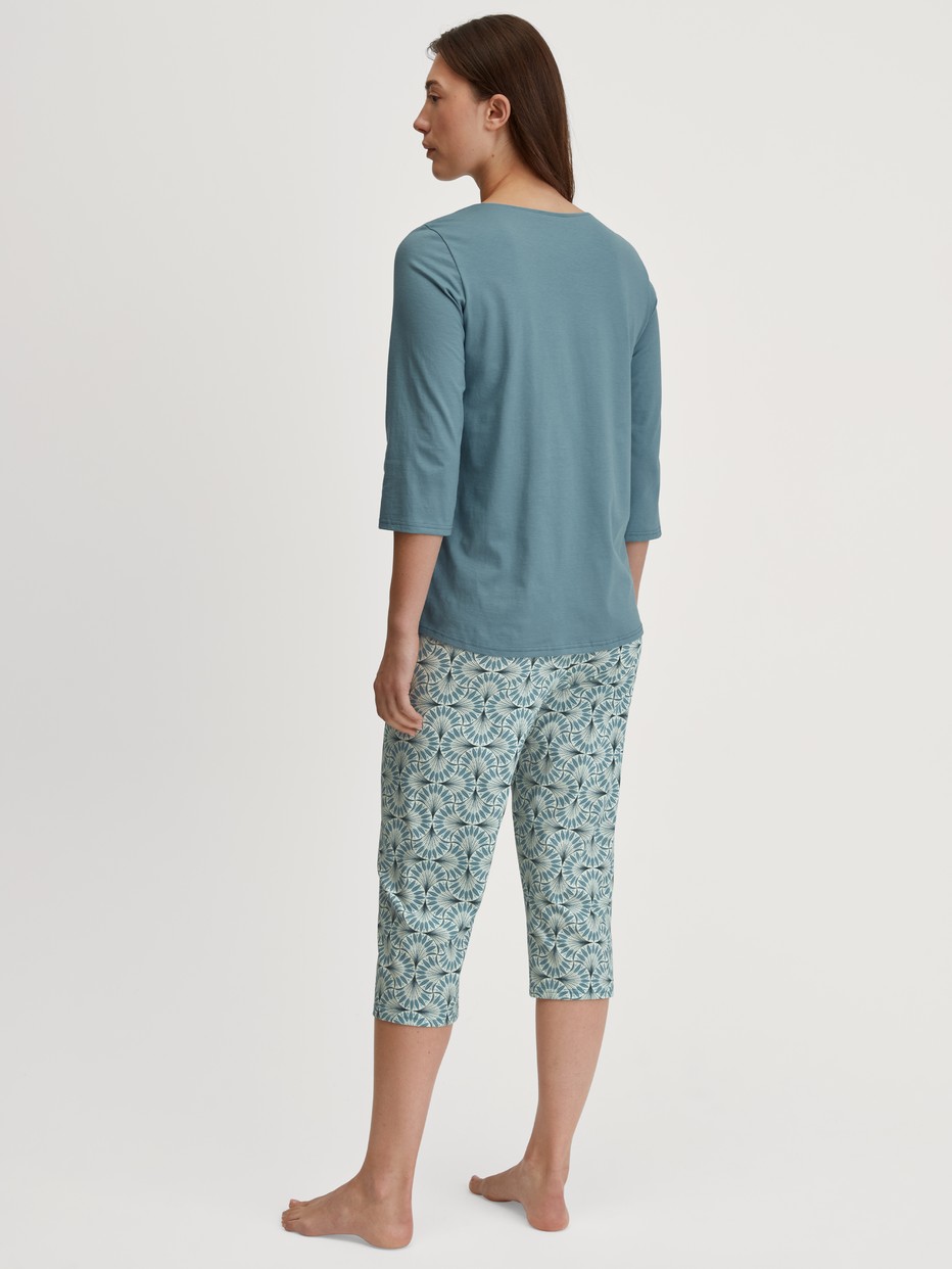 Women model is wearing  made of 100% Cotton in Blue, Patterned from the Ornament Nights series by CALIDA, Back view