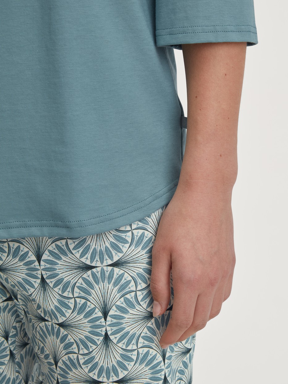 Women model is wearing  made of 100% Cotton in Blue, Patterned from the Ornament Nights series by CALIDA, Detail