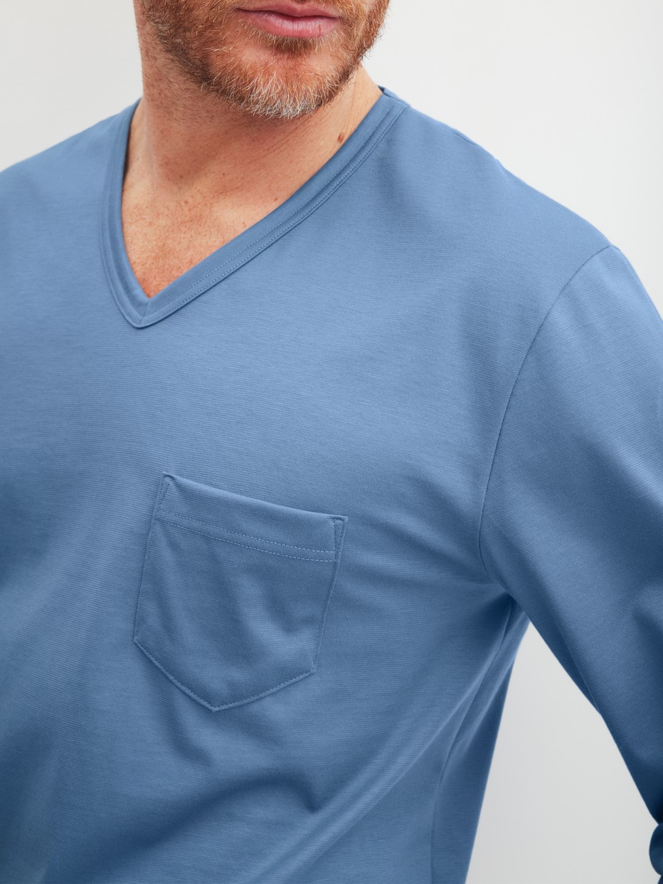 Men model is wearing Pyjamas, long made of 100% Cotton in Blue, Patterned from the Relax Imprint 2 series by CALIDA, Detail