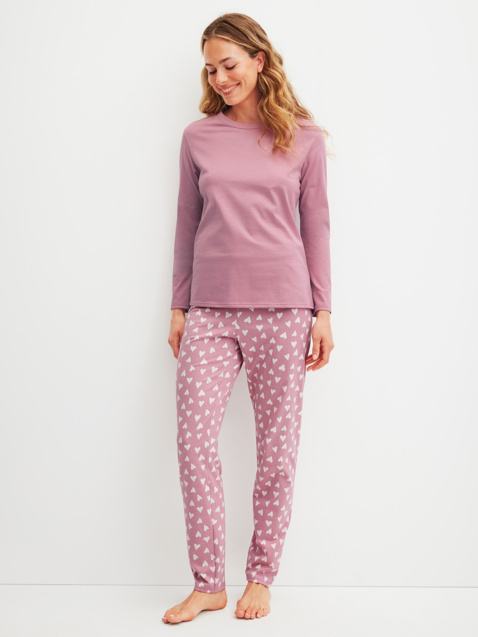 Damen-Model trägt Pyjama, lang aus 100% Baumwolle in Rosa, Gemustert aus Serie Cotton Special von CALIDA, Vorderansicht