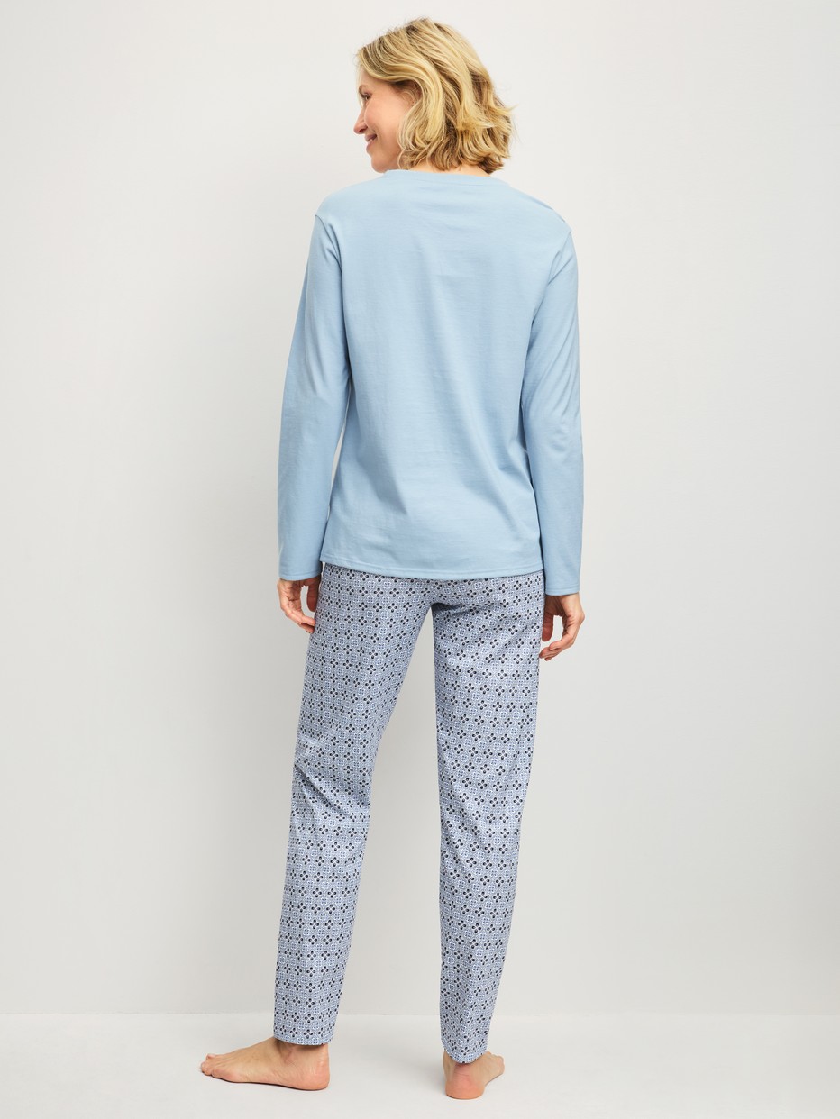 Women model is wearing Pyjamas, long made of 100% Cotton in Grey, Patterned from the Cotton Special series by CALIDA, Back view
