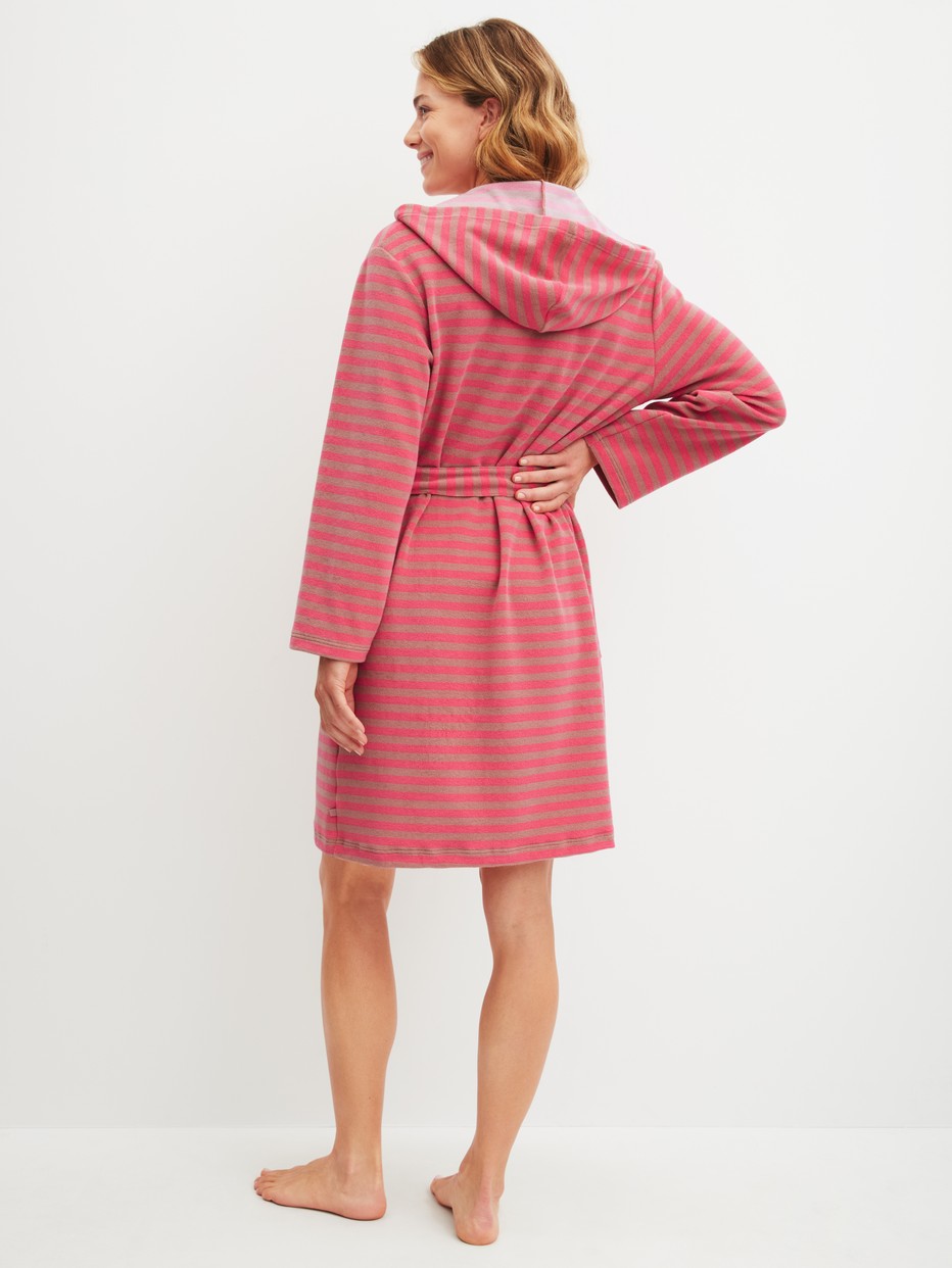 Women model is wearing Bathrobe, length 100 cm made of Cotton in Brown, Striped from the Lounge Stripe series by CALIDA, Back view