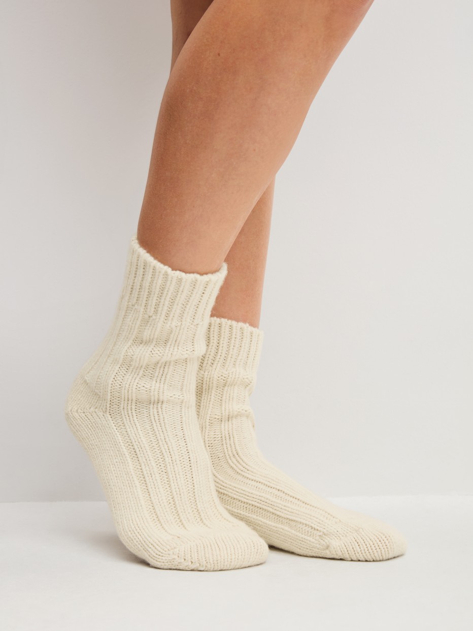 Women model is wearing  made of  in Beige,  from the Alpine M&M series by CALIDA, Front view